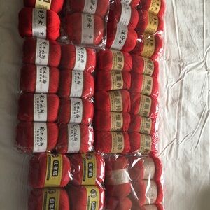 Red cashmere roll for hand knitting and crochet